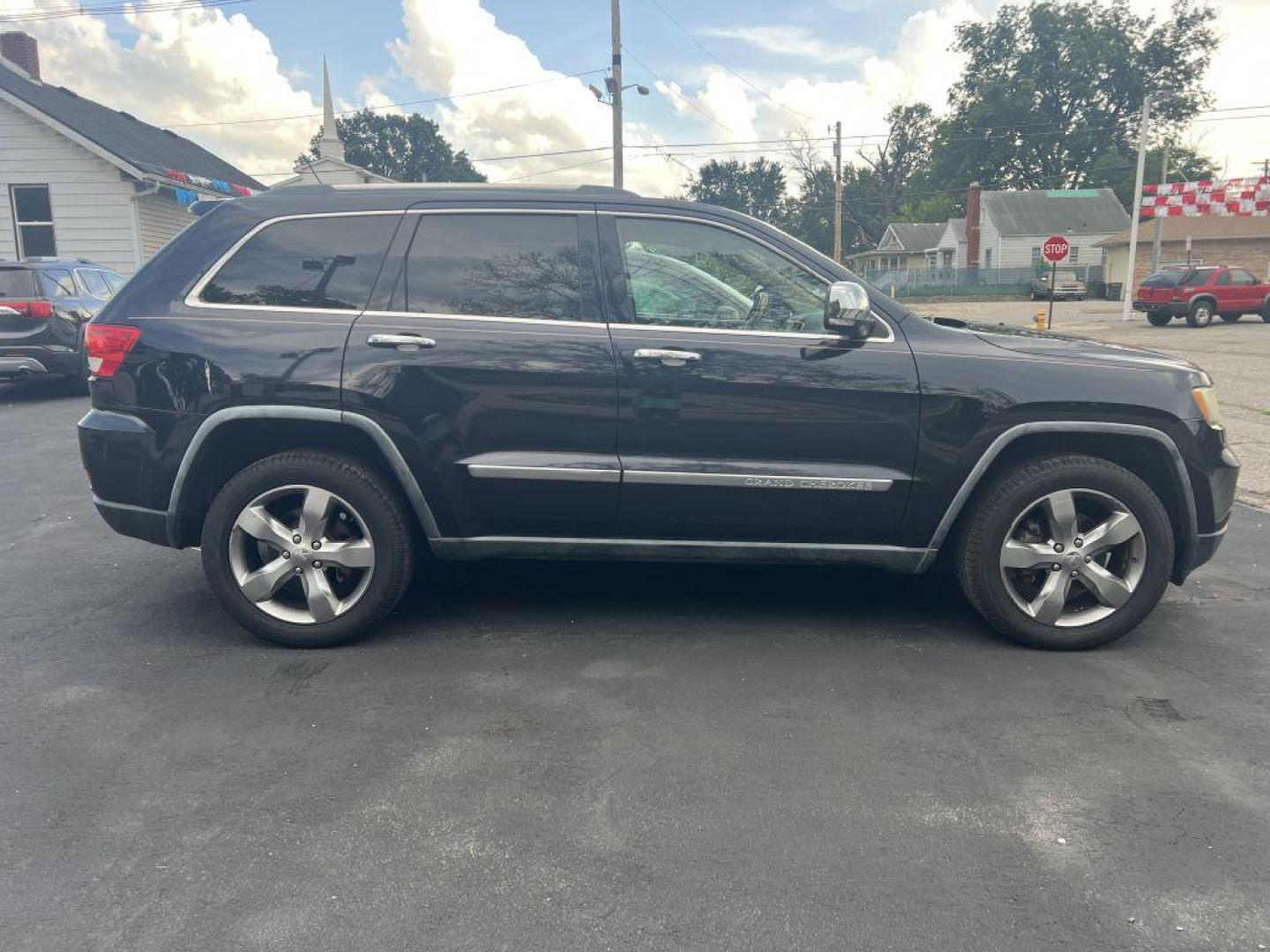 2011 BLACK JEEP GRAND CHEROKEE OVERLAND (1J4RR6GG8BC) with an 3.6L engine, Automatic transmission, located at 1056 E Riverside Dr, Evansville, IN, 47714, (812) 423-7026, 37.953491, -87.546654 - Photo#0
