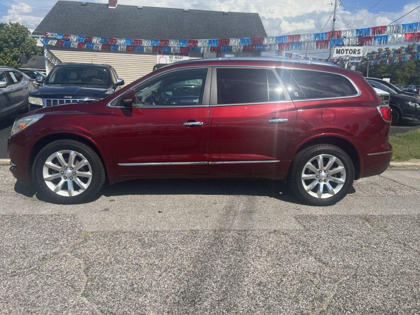 2017 MAROON BUICK ENCLAVE (5GAKVCKD2HJ) with an 3.6L engine, Automatic transmission, located at 1056 E Riverside Dr, Evansville, IN, 47714, (812) 423-7026, 37.953491, -87.546654 - Photo#0
