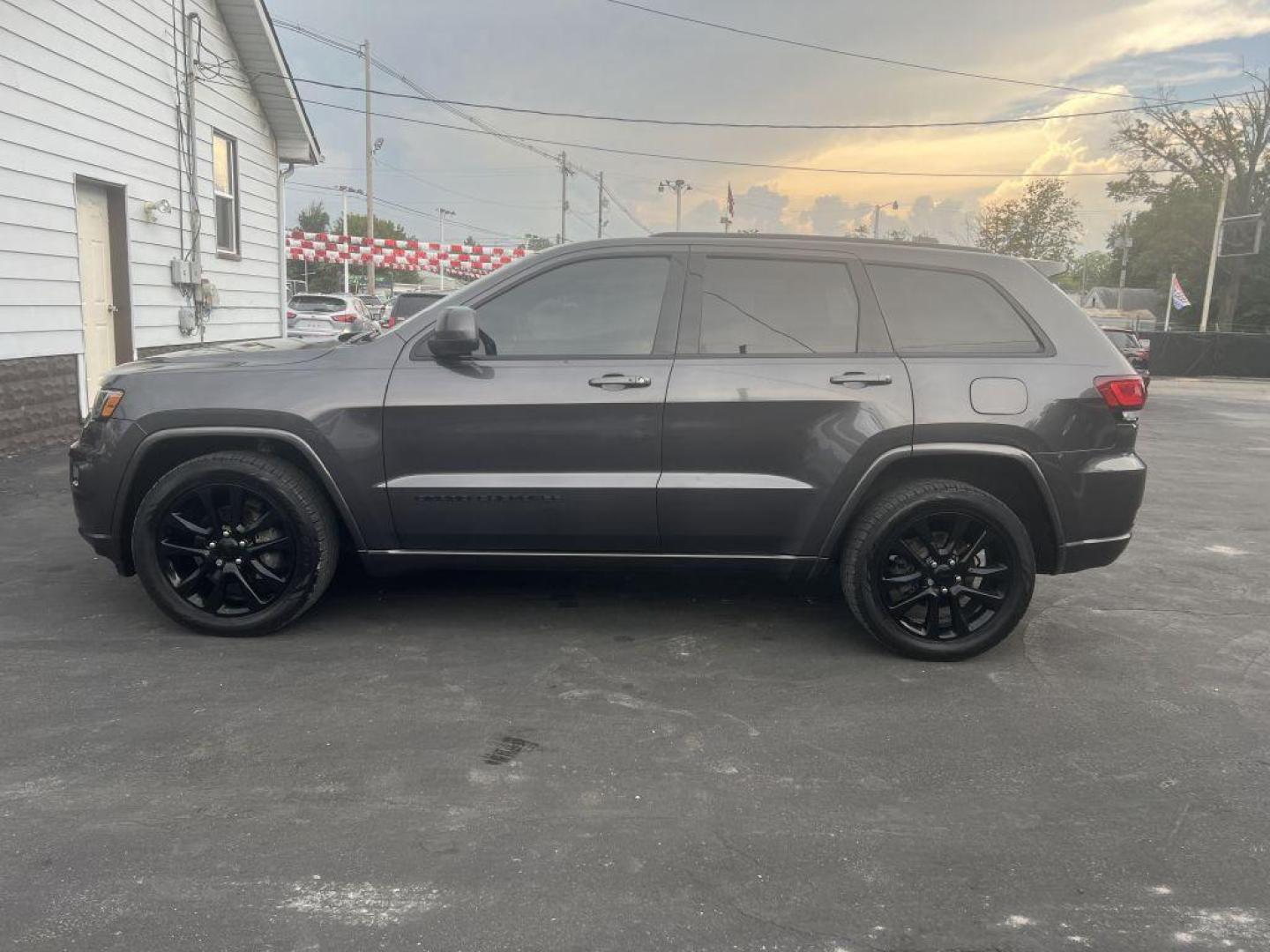 2017 GRAY JEEP GRAND CHEROKEE LAREDO (1C4RJFAG2HC) with an 3.6L engine, Automatic transmission, located at 1056 E Riverside Dr, Evansville, IN, 47714, (812) 423-7026, 37.953491, -87.546654 - Photo#0