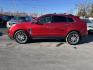 2016 RED CADILLAC SRX PREMIUM COLLECTION (3GYFNDE34GS) with an 3.6L engine, Automatic transmission, located at 1056 E Riverside Dr, Evansville, IN, 47714, (812) 423-7026, 37.953491, -87.546654 - Photo#0