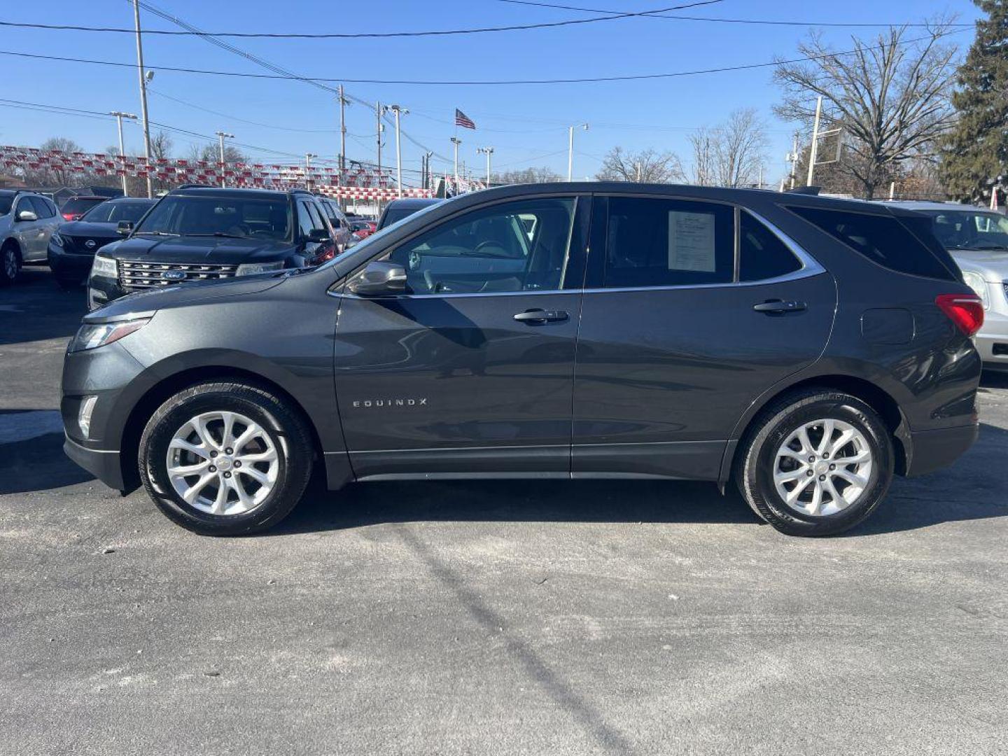 2018 BLACK CHEVROLET EQUINOX LT (2GNAXJEV8J6) with an 1.5L engine, Automatic transmission, located at 1056 E Riverside Dr, Evansville, IN, 47714, (812) 423-7026, 37.953491, -87.546654 - Photo#0