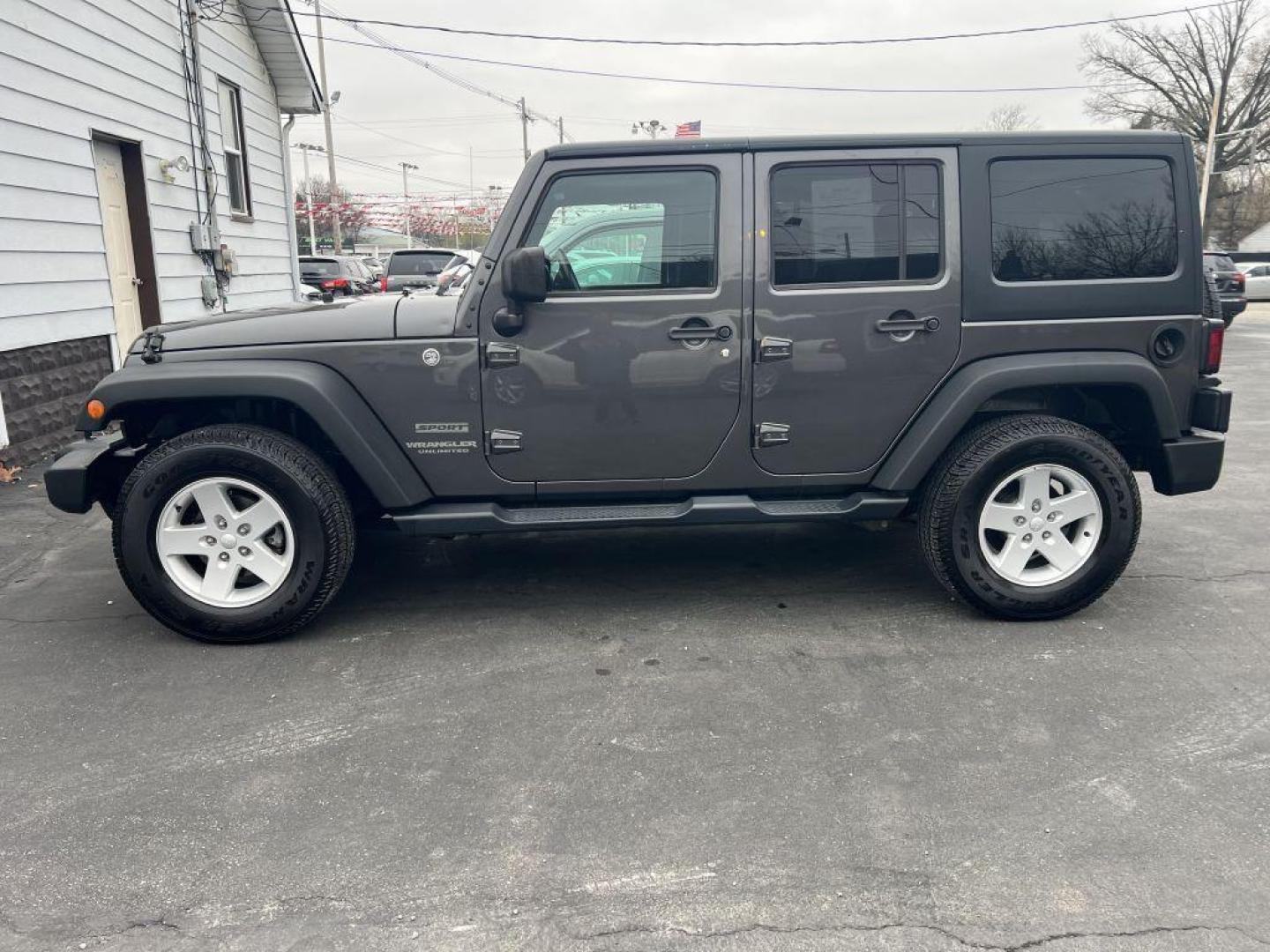 2017 GRAY JEEP WRANGLER UNLIMI SPORT (1C4BJWDG4HL) with an 3.6L engine, Automatic transmission, located at 1056 E Riverside Dr, Evansville, IN, 47714, (812) 423-7026, 37.953491, -87.546654 - Photo#0