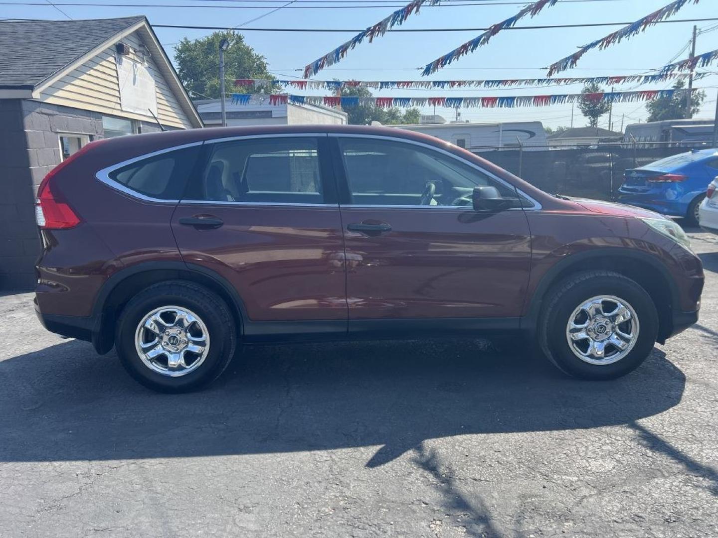 2015 MAROON HONDA CR-V LX (5J6RM4H37FL) with an 2.4L engine, Continuously Variable transmission, located at 1056 E Riverside Dr, Evansville, IN, 47714, (812) 423-7026, 37.953491, -87.546654- Photo#0