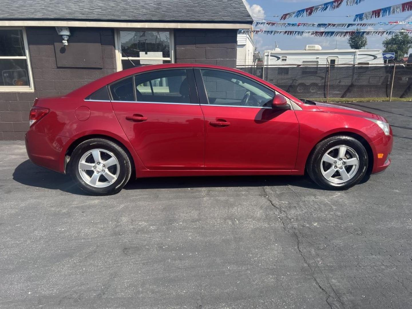 2013 RED CHEVROLET CRUZE LT (1G1PC5SB3D7) with an 1.4L engine, Automatic transmission, located at 1056 E Riverside Dr, Evansville, IN, 47714, (812) 423-7026, 37.953491, -87.546654- Photo#0