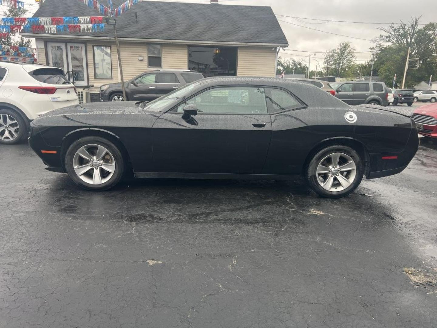 2021 BLACK DODGE CHALLENGER SXT (2C3CDZAG7MH) with an 3.6L engine, Automatic transmission, located at 1056 E Riverside Dr, Evansville, IN, 47714, (812) 423-7026, 37.953491, -87.546654- Photo#0