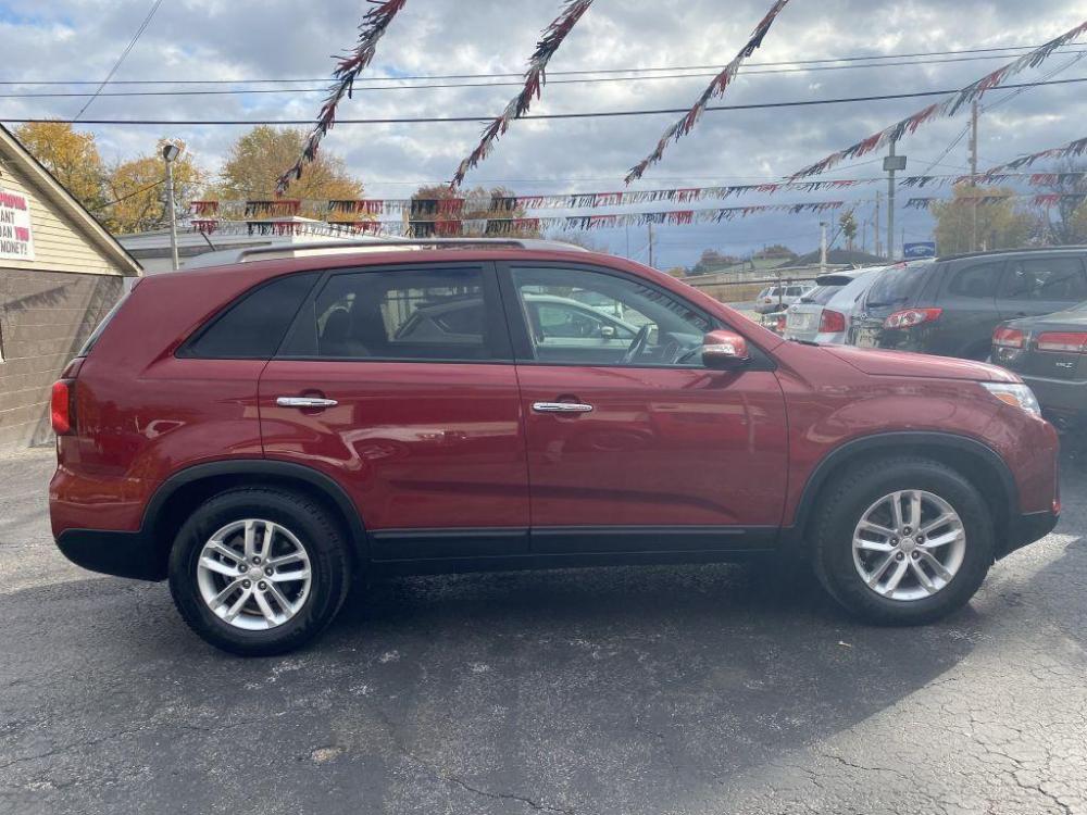 2015 RED KIA SORENTO LX (5XYKT3A61FG) with an 2.4L engine, Automatic transmission, located at 1056 E Riverside Dr, Evansville, IN, 47714, (812) 423-7026, 0.000000, 0.000000 - Photo #0