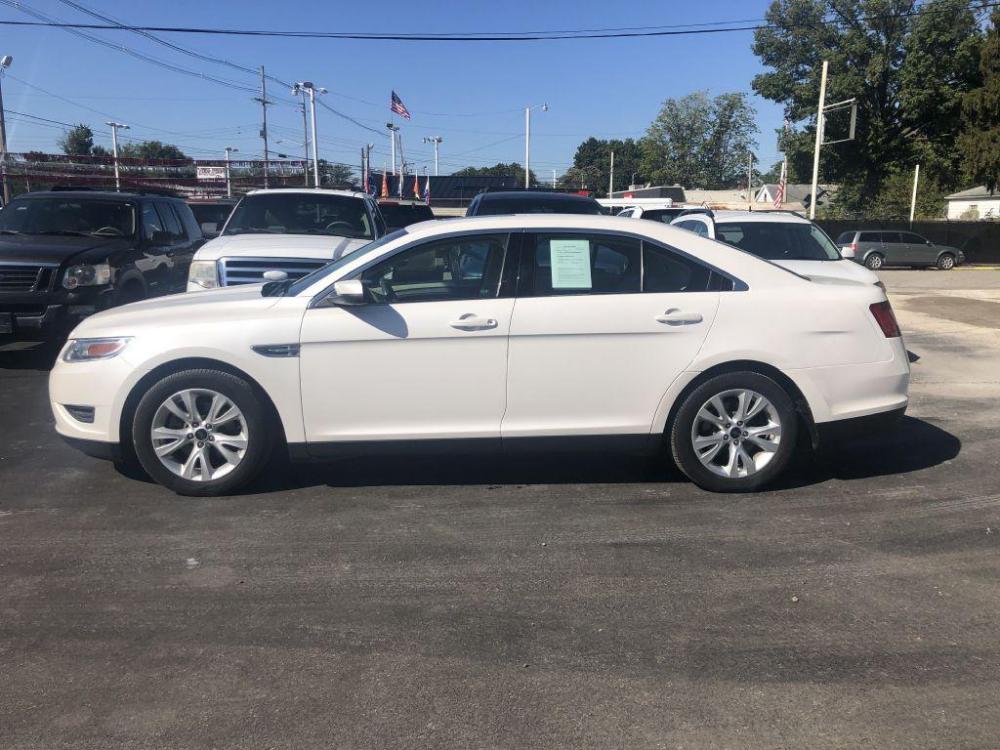 2012 WHITE FORD TAURUS SEL (1FAHP2EWXCG) with an 3.5L engine, Automatic transmission, located at 1056 E Riverside Dr, Evansville, IN, 47714, (812) 423-7026, 0.000000, 0.000000 - Photo #0
