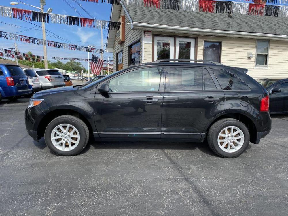 2013 BLACK FORD EDGE SE (2FMDK3GC3DB) with an 3.5L engine, Automatic transmission, located at 1056 E Riverside Dr, Evansville, IN, 47714, (812) 423-7026, 0.000000, 0.000000 - Photo #0