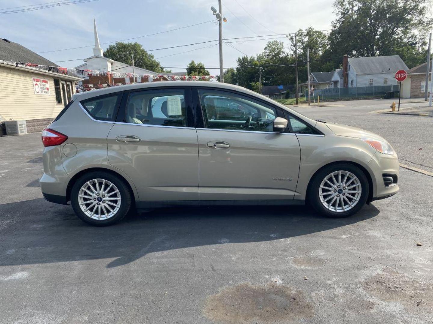 2016 GOLD FORD C-MAX SEL (1FADP5BU8GL) with an 2.0L engine, Continuously Variable transmission, located at 1056 E Riverside Dr, Evansville, IN, 47714, (812) 423-7026, 37.953491, -87.546654 - Photo#0