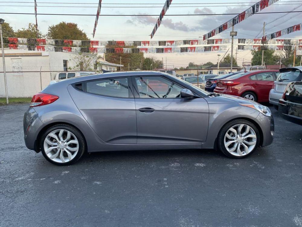 2012 GRAY HYUNDAI VELOSTER (KMHTC6AD6CU) with an 1.6L engine, Automatic transmission, located at 1056 E Riverside Dr, Evansville, IN, 47714, (812) 423-7026, 0.000000, 0.000000 - Photo #0
