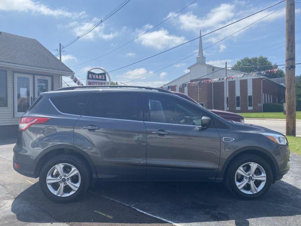 2016 GREY FORD ESCAPE SE (1FMCU9GX6GU) with an 1.6L engine, Automatic transmission, located at 1056 E Riverside Dr, Evansville, IN, 47714, (812) 423-7026, 0.000000, 0.000000 - Photo #0