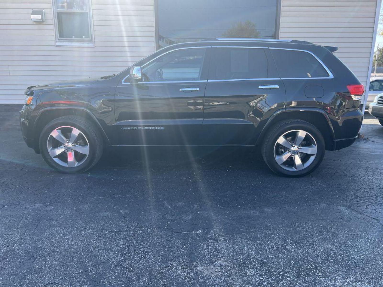 2014 BLACK JEEP GRAND CHEROKEE OVERLAND (1C4RJFCG8EC) with an 3.6L engine, Automatic transmission, located at 1056 E Riverside Dr, Evansville, IN, 47714, (812) 423-7026, 37.953491, -87.546654 - Photo #0