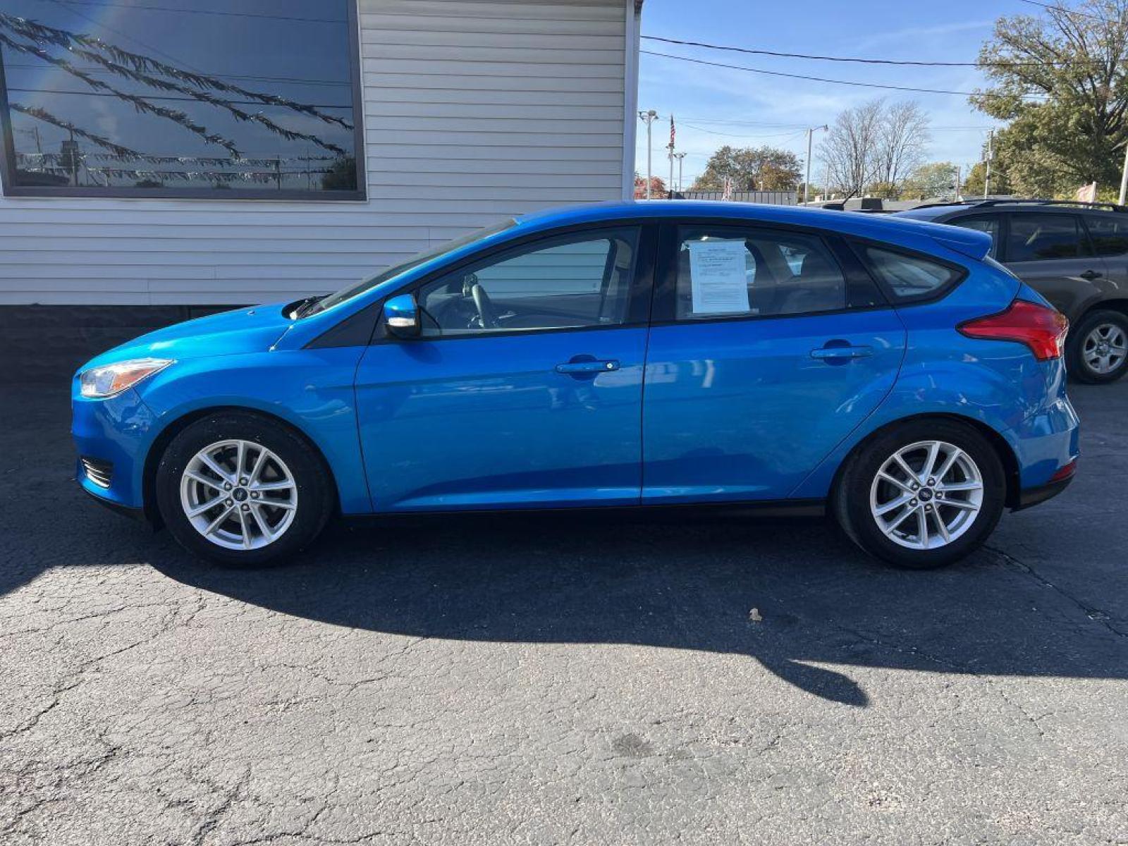 2016 BLUE FORD FOCUS SE (1FADP3K22GL) with an 2.0L engine, Automatic transmission, located at 1056 E Riverside Dr, Evansville, IN, 47714, (812) 423-7026, 37.953491, -87.546654 - Photo #0