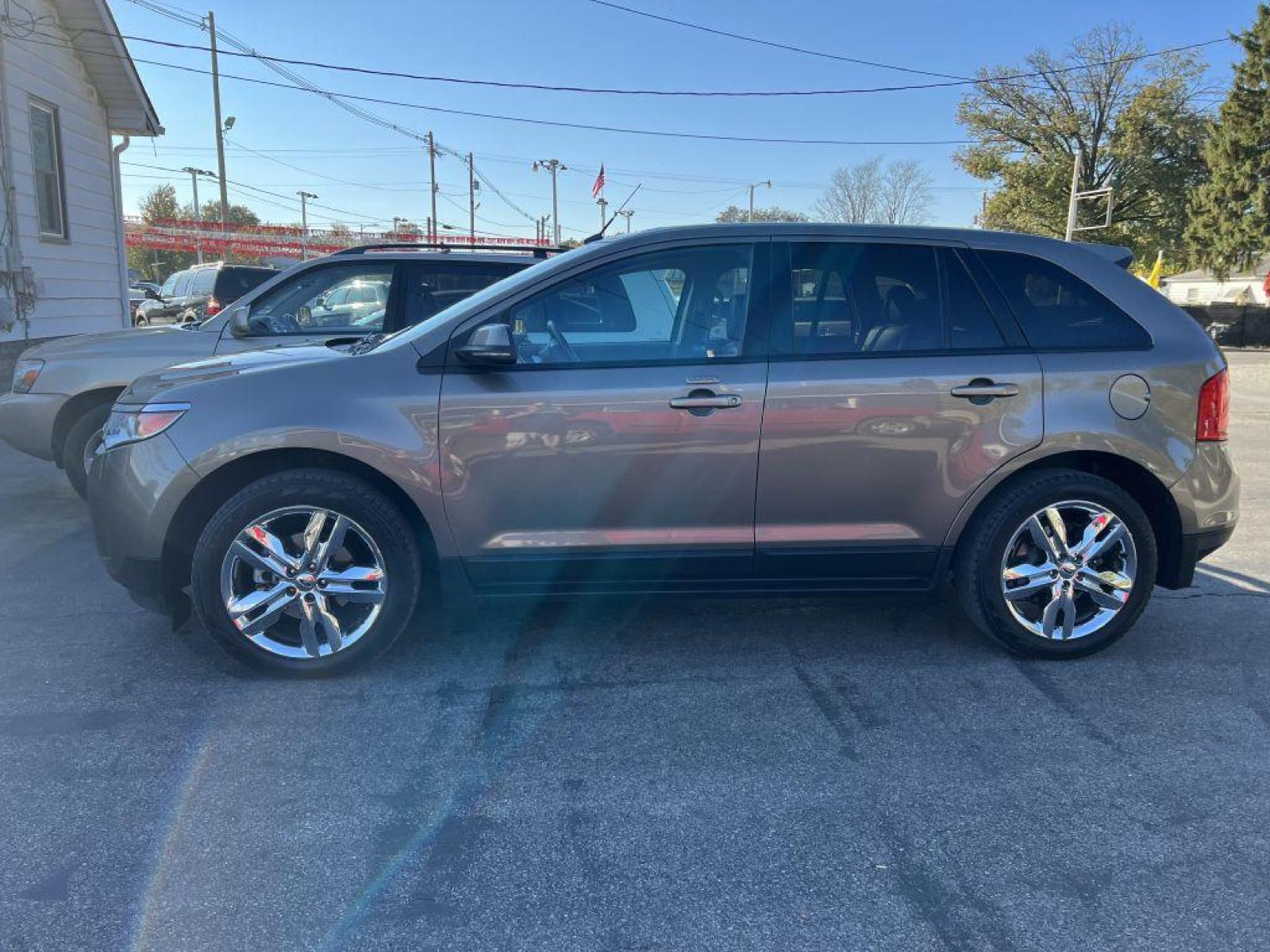 2012 BRONZE FORD EDGE SEL (2FMDK3J90CB) with an 2.0L engine, Automatic transmission, located at 1056 E Riverside Dr, Evansville, IN, 47714, (812) 423-7026, 37.953491, -87.546654 - Photo #0