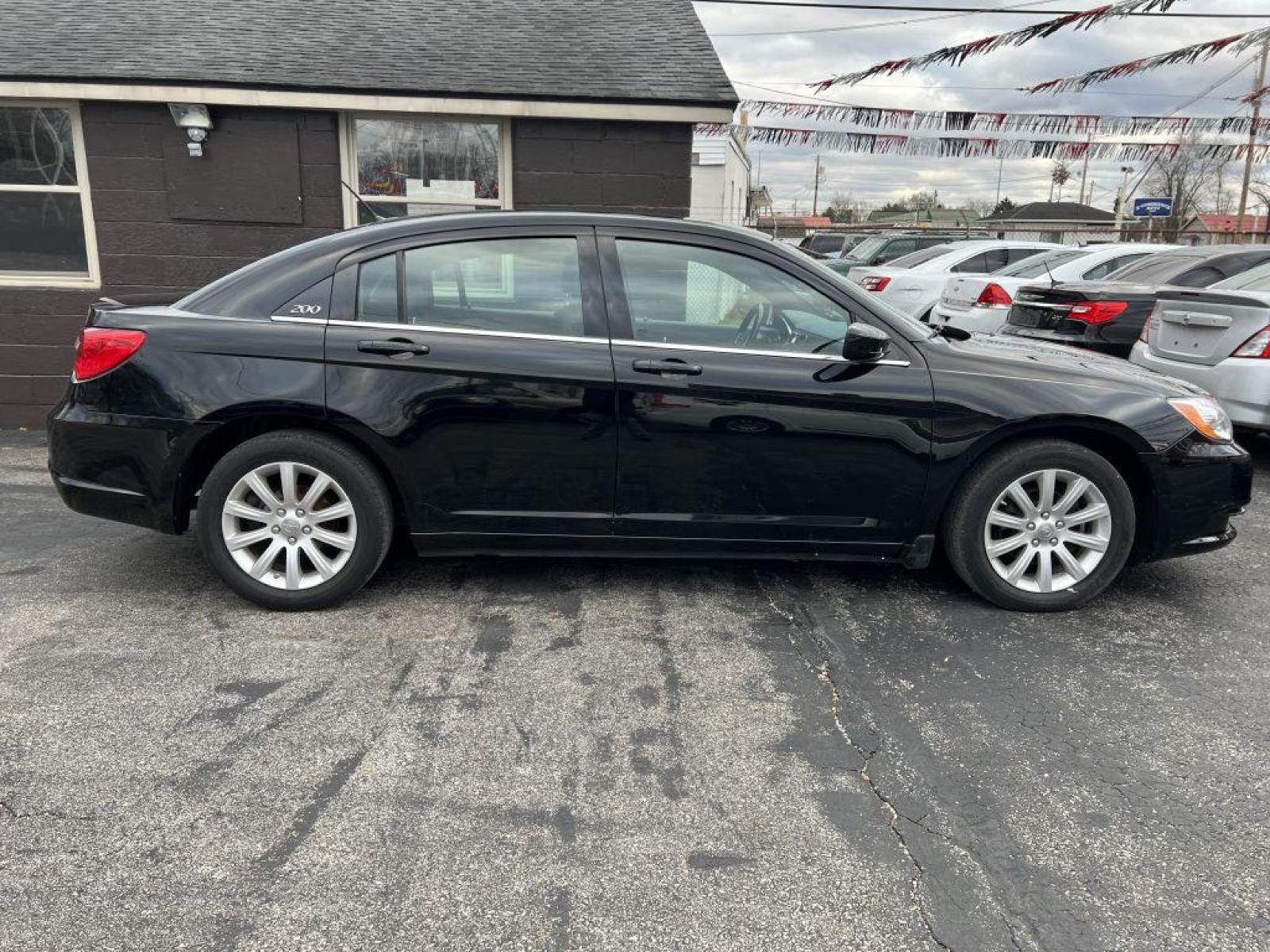 2014 BLACK CHRYSLER 200 TOURING (1C3CCBBBXEN) with an 2.4L engine, Automatic transmission, located at 1056 E Riverside Dr, Evansville, IN, 47714, (812) 423-7026, 37.953491, -87.546654 - Photo #0