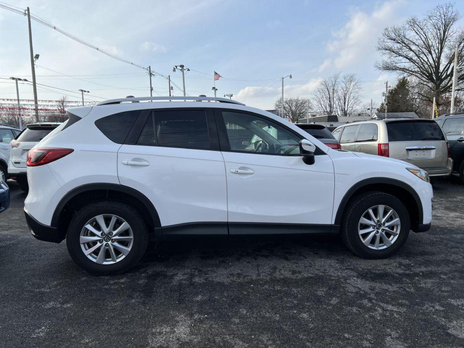 2016 WHITE MAZDA CX-5 TOURING (JM3KE2CY8G0) with an 2.5L engine, Automatic transmission, located at 1056 E Riverside Dr, Evansville, IN, 47714, (812) 423-7026, 37.953491, -87.546654 - Photo #0