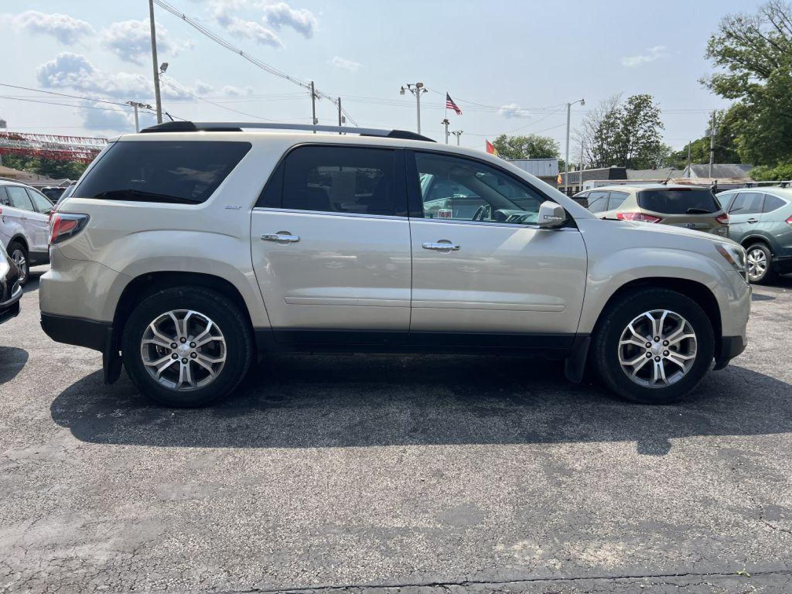 2014 TAN GMC ACADIA SLT-1 (1GKKRRKD3EJ) with an 3.6L engine, Automatic transmission, located at 1056 E Riverside Dr, Evansville, IN, 47714, (812) 423-7026, 37.953491, -87.546654 - Photo #0