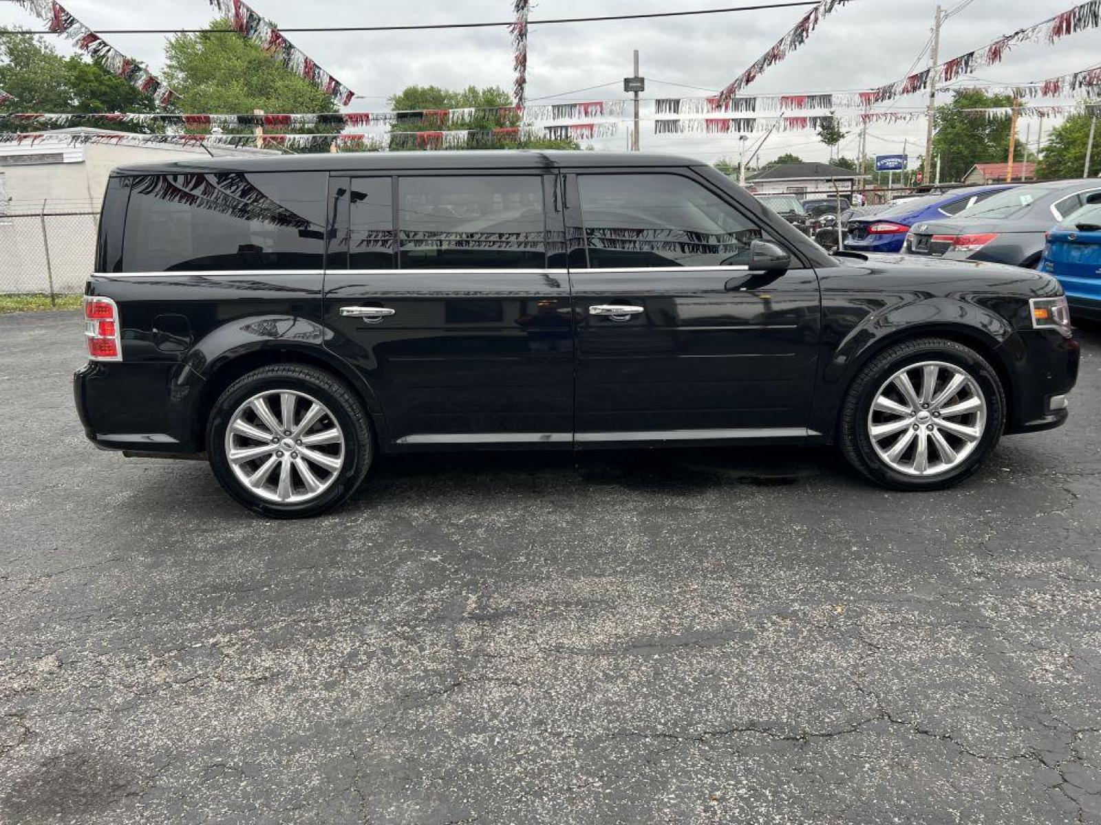 2014 BLACK FORD FLEX LIMITED (2FMHK6DT6EB) with an 3.5L engine, Automatic transmission, located at 1056 E Riverside Dr, Evansville, IN, 47714, (812) 423-7026, 37.953491, -87.546654 - Photo #0