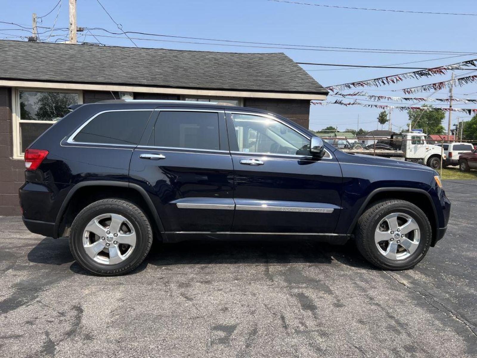 2011 BLUE JEEP GRAND CHEROKEE LIMITED (1J4RR5GG6BC) with an 3.6L engine, Automatic transmission, located at 1056 E Riverside Dr, Evansville, IN, 47714, (812) 423-7026, 37.953491, -87.546654 - Photo #0