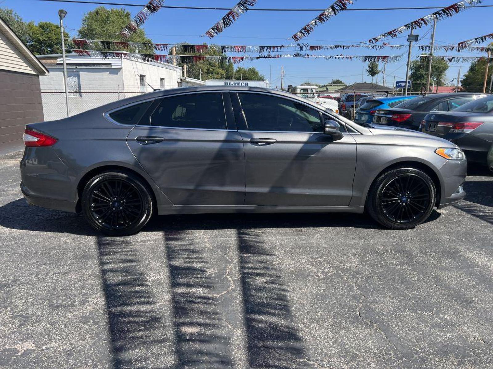 2014 GRAY FORD FUSION SE (1FA6P0HD6E5) with an 1.5L engine, Automatic transmission, located at 1056 E Riverside Dr, Evansville, IN, 47714, (812) 423-7026, 37.953491, -87.546654 - Photo #0