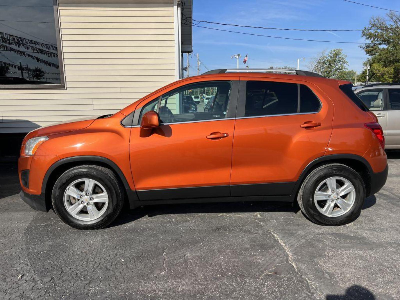 2016 ORANGE CHEVROLET TRAX 1LT (KL7CJLSB6GB) with an 1.4L engine, Automatic transmission, located at 1056 E Riverside Dr, Evansville, IN, 47714, (812) 423-7026, 37.953491, -87.546654 - Photo #0