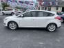 2015 WHITE FORD FOCUS TITANIUM (1FADP3N23FL) with an 2.0L engine, Automatic transmission, located at 1056 E Riverside Dr, Evansville, IN, 47714, (812) 423-7026, 37.953491, -87.546654 - Photo#0
