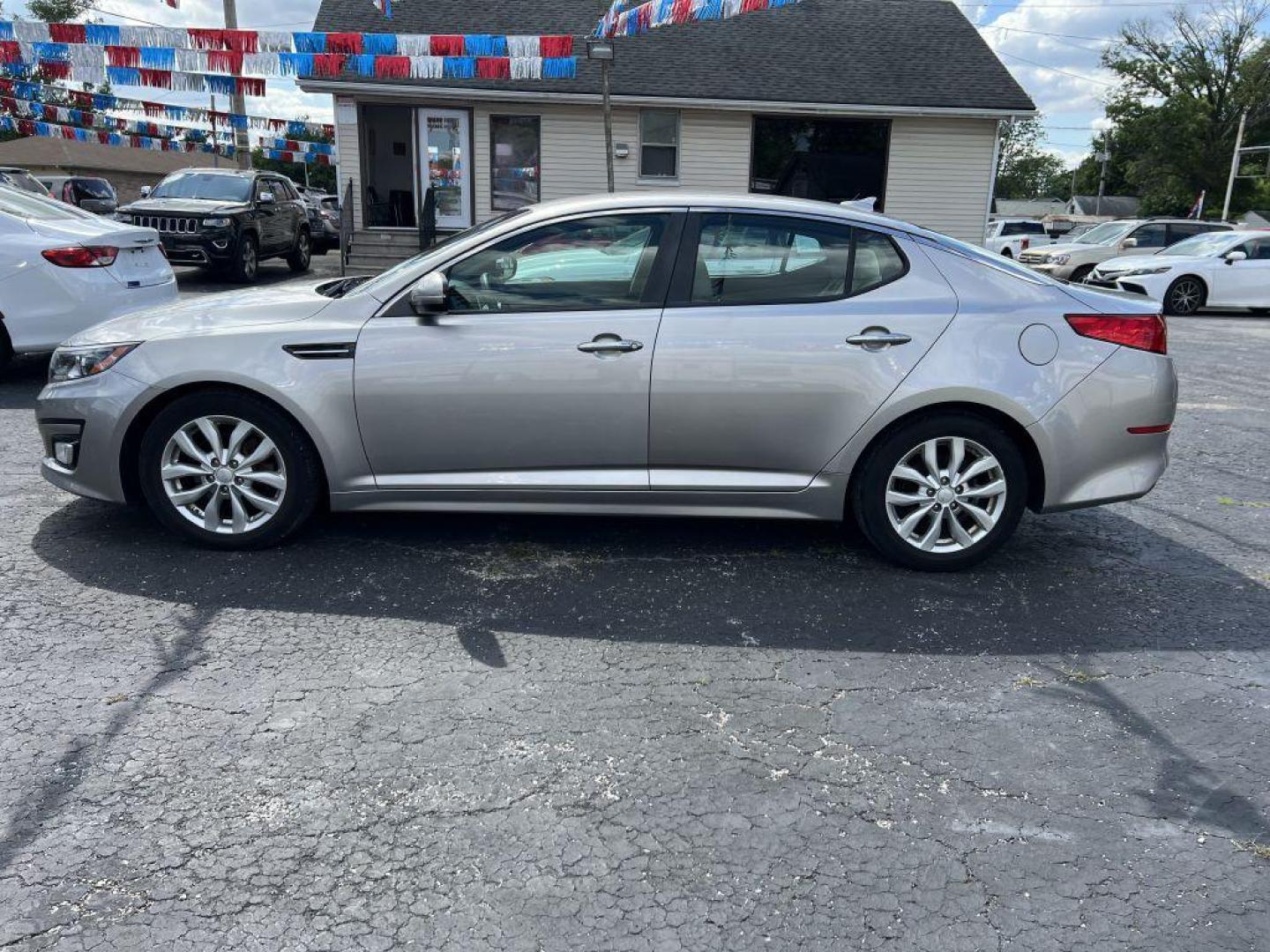 2015 SILVER KIA OPTIMA LX (5XXGM4A77FG) with an 2.4L engine, Automatic transmission, located at 1056 E Riverside Dr, Evansville, IN, 47714, (812) 423-7026, 37.953491, -87.546654 - Photo#0