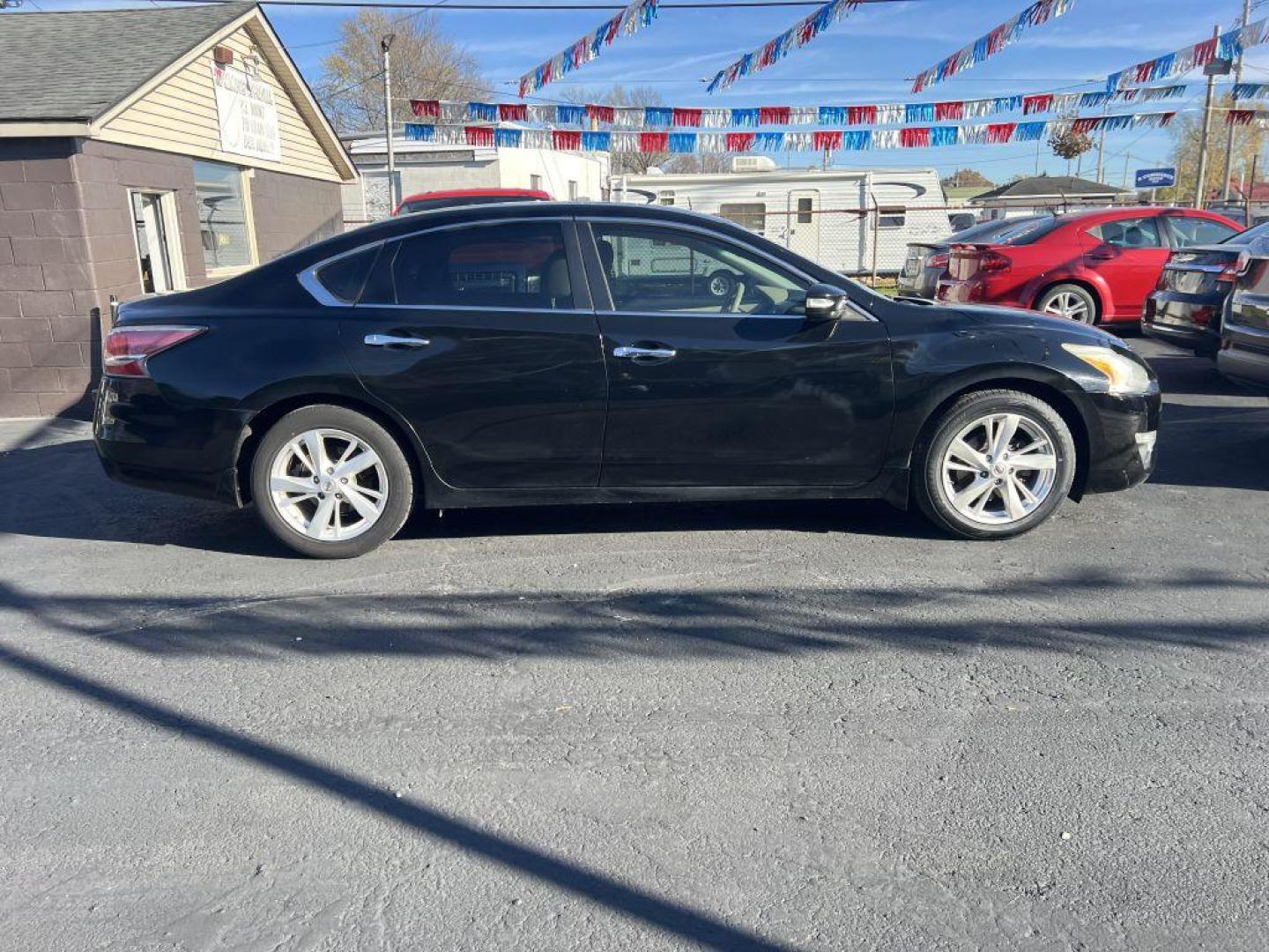 2015 BLACK NISSAN ALTIMA 2.5 (1N4AL3AP2FN) with an 2.5L engine, Continuously Variable transmission, located at 1056 E Riverside Dr, Evansville, IN, 47714, (812) 423-7026, 37.953491, -87.546654 - Photo#0