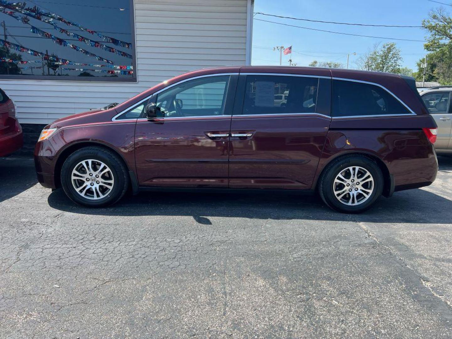 2012 MARRON HONDA ODYSSEY EXL (5FNRL5H64CB) with an 3.5L engine, Automatic transmission, located at 1056 E Riverside Dr, Evansville, IN, 47714, (812) 423-7026, 37.953491, -87.546654 - Photo#0