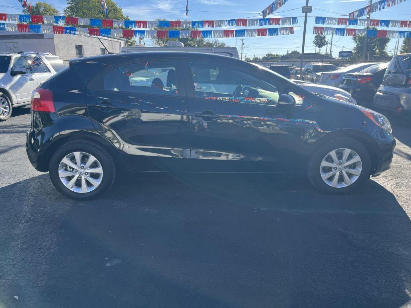 2012 BLACK KIA RIO EX (KNADN5A38C6) with an 1.6L engine, Automatic transmission, located at 1056 E Riverside Dr, Evansville, IN, 47714, (812) 423-7026, 37.953491, -87.546654 - Photo#0