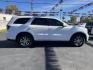 2014 WHITE DODGE DURANGO LIMITED (1C4RDJDG2EC) with an 3.6L engine, Automatic transmission, located at 1056 E Riverside Dr, Evansville, IN, 47714, (812) 423-7026, 37.953491, -87.546654- Photo#0