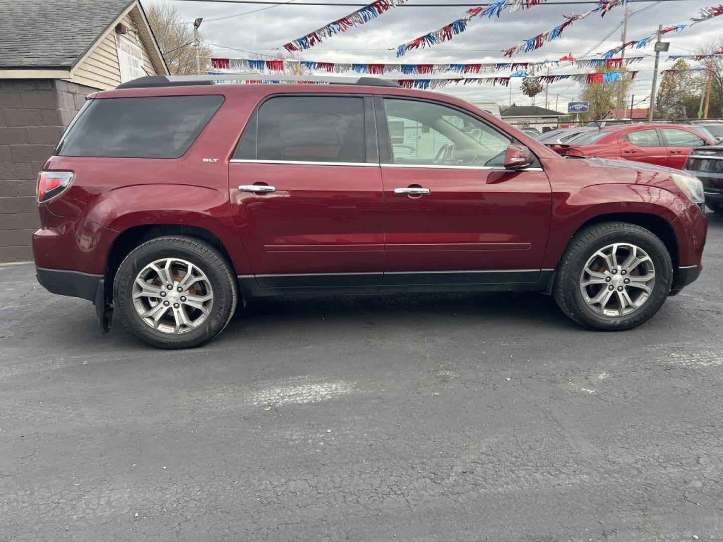 2015 MAROON GMC ACADIA SLT-1 (1GKKVRKD7FJ) with an 3.6L engine, Automatic transmission, located at 1056 E Riverside Dr, Evansville, IN, 47714, (812) 423-7026, 37.953491, -87.546654 - Photo#0