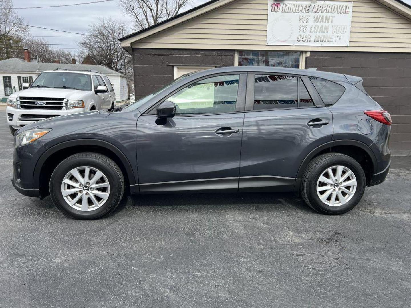 2014 GRAY MAZDA CX-5 TOURING (JM3KE2CY0E0) with an 2.5L engine, Automatic transmission, located at 1056 E Riverside Dr, Evansville, IN, 47714, (812) 423-7026, 37.953491, -87.546654 - Photo#0
