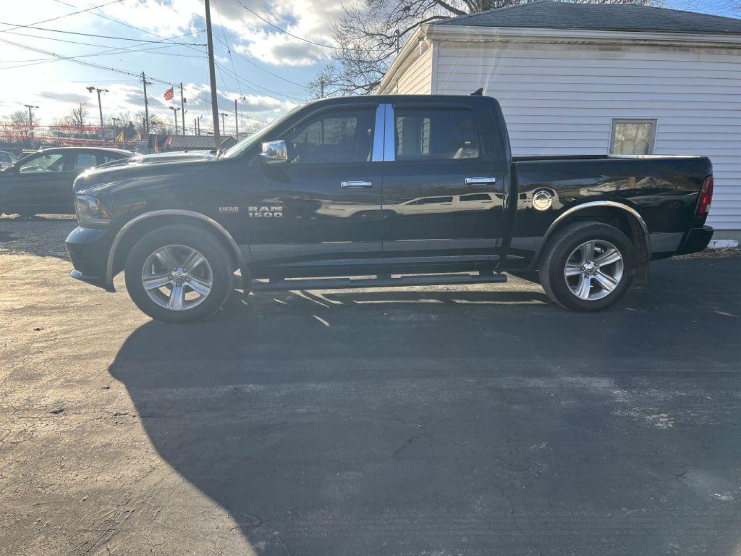2013 BLACK RAM 1500 SPORT (1C6RR6MT2DS) with an 5.7L engine, Automatic transmission, located at 1056 E Riverside Dr, Evansville, IN, 47714, (812) 423-7026, 37.953491, -87.546654 - Photo#0